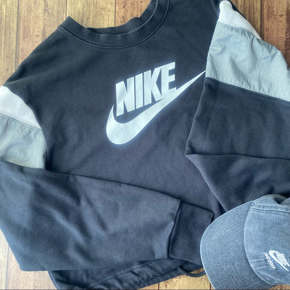Nike Women’s Cropped Sweatshirt. Black. Gray & White stripped. Drawstring waist.